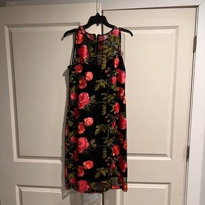 Beautiful black and coral tone sleeveless dress. Great for any occasion.